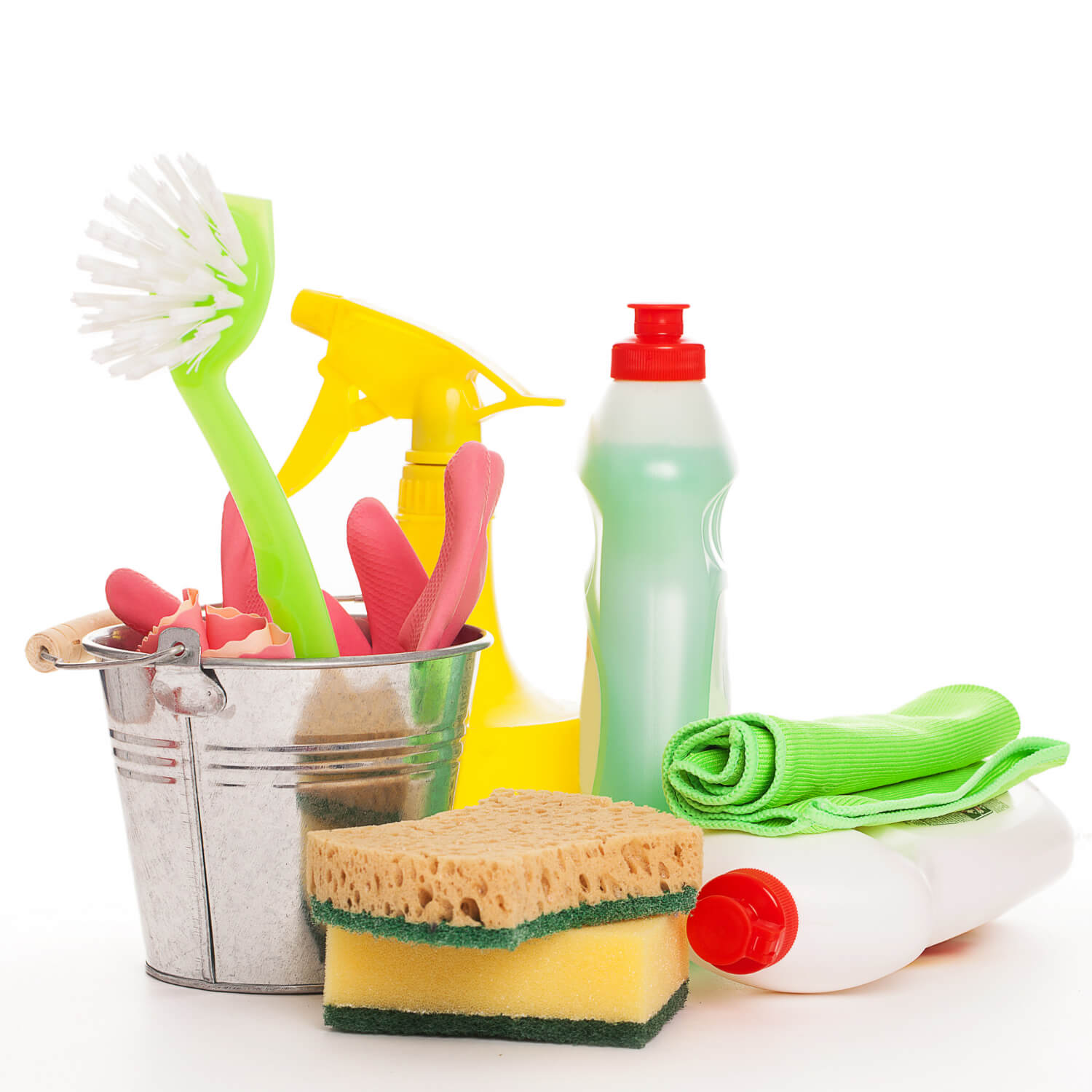 bright colorful cleaning profucts and supplies on wooden white table and white wall behind