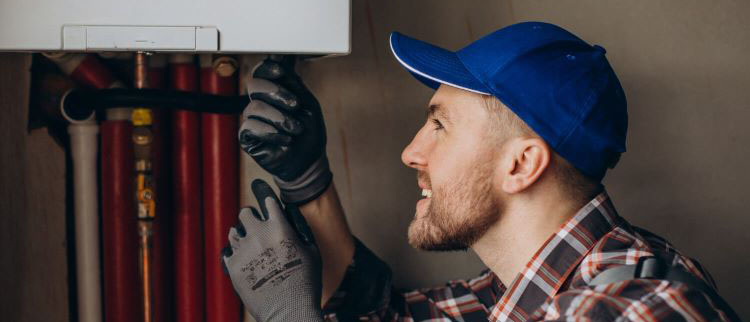 engineer checking the gas boiler system